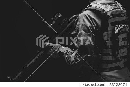 Soldier holding a gun 88128674