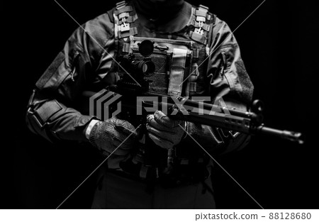 Soldier holding a gun 88128680