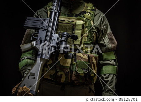Soldier holding a gun 88128701