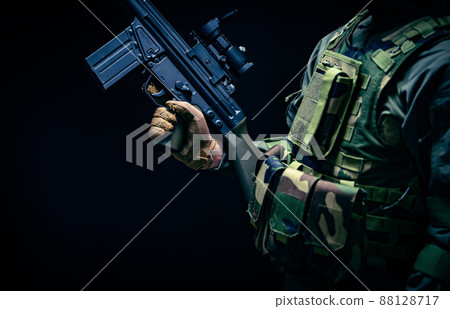 Soldier holding a gun 88128717