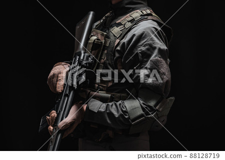 Soldier holding a gun 88128719