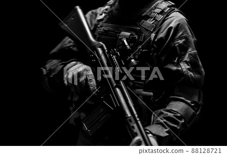 Soldier holding a gun 88128721