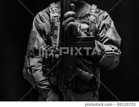 Soldier holding a gun 88128733
