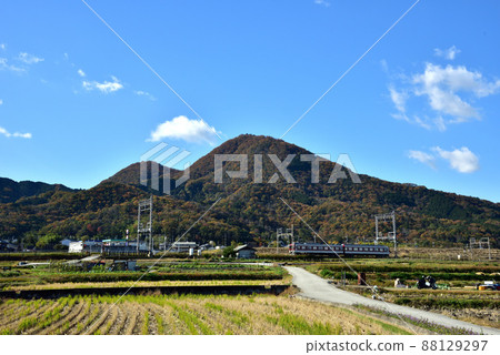 Mt. Nijo in autumn colors and Kintetsu train Mt. Nijo in autumn colors and Kintetsu train 88129297