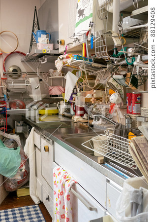 Dirty kitchen full of things, cluttered and unorganized 88129408