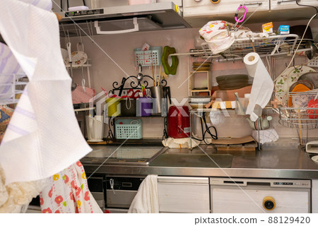 Dirty kitchen full of things, cluttered and unorganized Dirty kitchen full of things, cluttered and unorganized 88129420