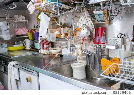 A messy kitchen with lots of things A messy kitchen with lots of things 88129466