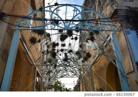 Vintage colonial style building facade in an alleyway of the heritage town of Penang, Malaysia 88130067