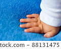 Child's hand on a blue veil,full hd video 88131475