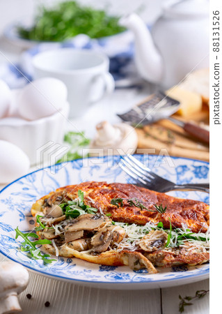 Omelet with mushrooms. Omelet with mushrooms. 88131526