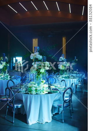 Table setup in blue light. Ready to event 88132084