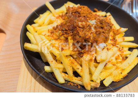 Curry-flavored french fries 88133783