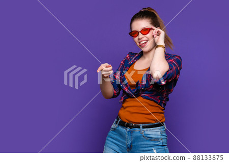 Funny hipster Girl in casual clothes Funny hipster Girl in casual clothes 88133875