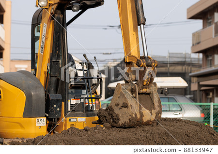 Small excavator car at the construction site 88133947