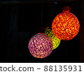 lamp in the form of a ball against the background of colorblack 88135931