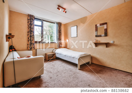 A mind-blowing room with a single bed and a comfortable sofa 88138682