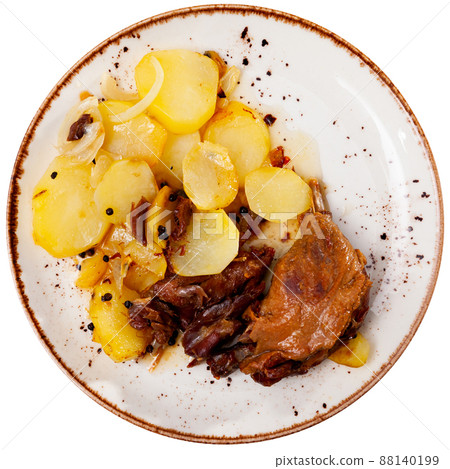 Portion of duck confit on table 88140199