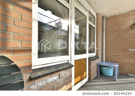 Mini balcony with city view and outdoors Mini balcony with city view and outdoors 88140283