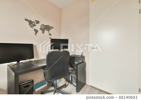 Work area with black furniture and computer 88140681