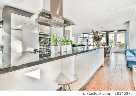 Corner kitchen with countertop located in contemporary flat Corner kitchen with countertop located in contemporary flat 88140873