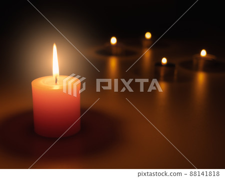 Light a candle in the dark, the flame warms and the light creates bokeh. Light and shadow create atmosphere. Things such as romantic, mysterious, interesting, and also make you feel faith. 88141818
