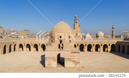 Courtyard of Ibn Tulun public historical mosque with ablution fountain and the minaret, Cairo, Egypt Courtyard of Ibn Tulun public historical mosque with ablution fountain and the minaret, Cairo, Egypt 88145275