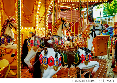 Horse carousel at amusement park Horse carousel at amusement park 88146003