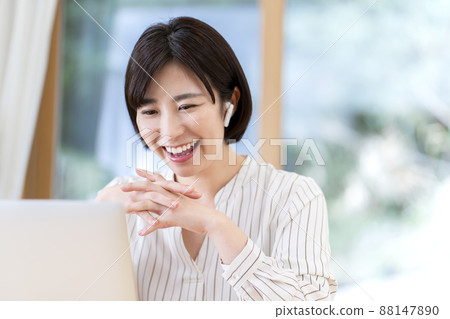 Video call of a young woman teleworking 88147890