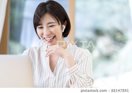 Video call of a young woman teleworking 88147891