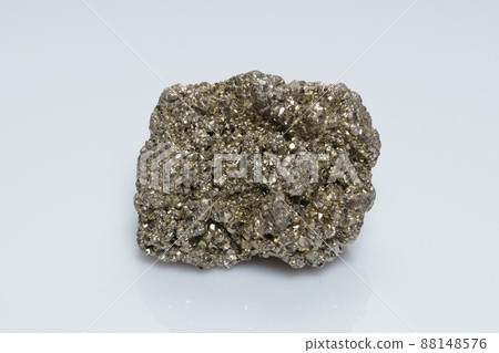 Raw crystalline pyrite iron pyrite, fool's gold . Mineral pyrite from the group of sulfides. The mineral pyrite on a white background 88148576