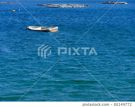 Abandoned ship left in the emerald blue sea Abandoned ship left in the emerald blue sea 88149772
