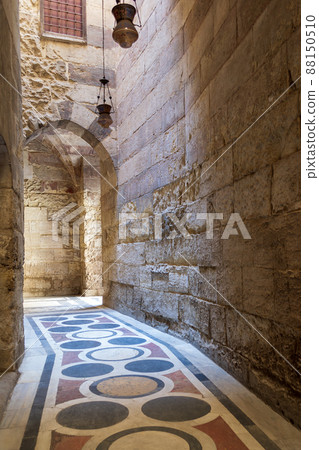 Vaulted passage leading to the Courtyard of Sultan Qalawun mosque with marble floor, Cairo, Egypt Vaulted passage leading to the Courtyard of Sultan Qalawun mosque with marble floor, Cairo, Egypt 88150510