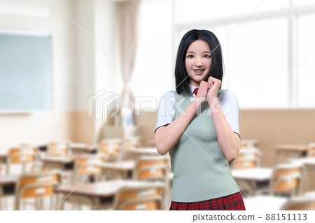 一個身穿綠色背心的半長高中女生在有課桌的教室裡擺姿勢手拉手。 一個身穿綠色背心的半長高中女生在有課桌的教室裡擺姿勢手拉手。 88151113