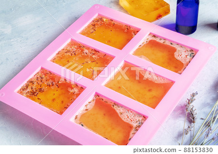 Handmade soap in a mold. Natural organic diy cosmetics with lavender Handmade soap in a mold. Natural organic diy cosmetics with lavender 88153830