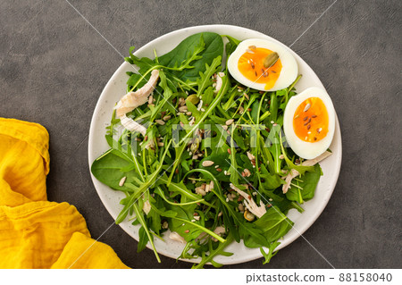 Salad with arugula, chicken breast and eggs 88158040