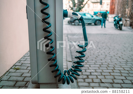 Electric car charging battery. Electric car power station with electricity charging battery tiny  88158211