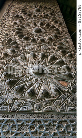 Geometrical engraved bronze decorations of the main entrance of Al Moaayad mosque, Cairo, Egypt Geometrical engraved bronze decorations of the main entrance of Al Moaayad mosque, Cairo, Egypt 88158769