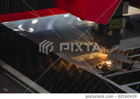 Close up scene fiber laser cutting machine cutting  machine cut the metal plate. 88160430