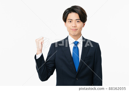 A young businessman who poses a gut 88162035