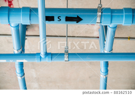 Sanitary work and installation of blue PVC pipes for the construction of residential buildings and large buildings, The location of the plumbing connection point is the large blue PVC pipe of the high 88162510