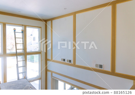 Under construction interior is installing drywall the room in new home Under construction interior is installing drywall the room in new home 88165126