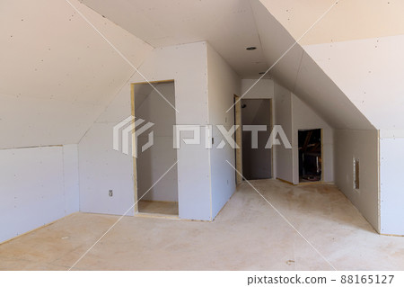 New construction of installing plasterboard in room new home drywall New construction of installing plasterboard in room new home drywall 88165127