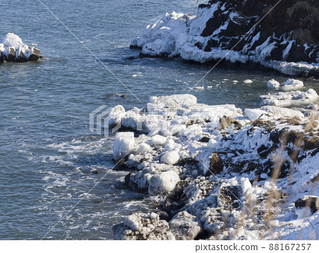 Drift ice washed up on the coast Cape Nosappu, Nemuro, Hokkaido, Japan 88167257