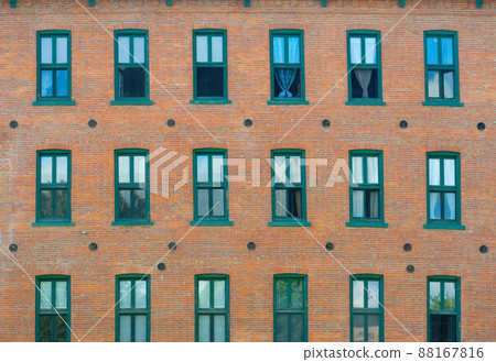 apartments in old shop brick and windows wall facade architecture 88167816