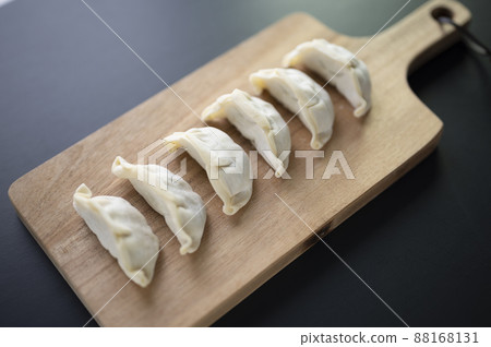 Handmade raw dumplings for one person 88168131