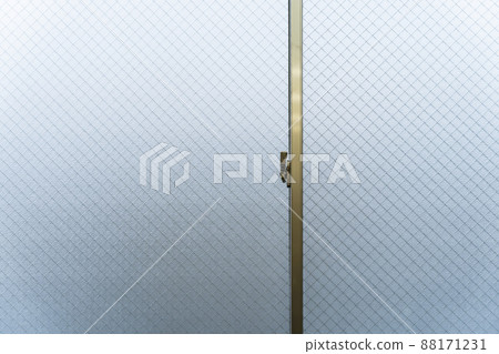 Frosted glass background with iron wire Frosted glass background with iron wire 88171231