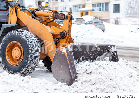 Cleaning and cleaning of roads in the city from snow in winter 88176723
