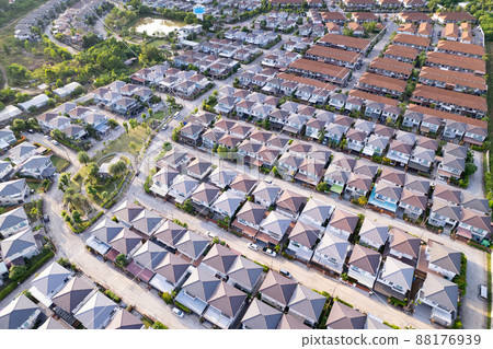 New development real estate. Aerial view of residential houses and driveways neighborhood during a fall sunset or sunrise time.Tightly packed homes.Top down view over private houses in phuket thailand 88176939