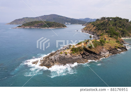 Aerial view phuket seashore Wave crashing on rocks at Laem promthep cape beautiful sea in Phuket Thailand.Phuket view point is famous tourist destination at Thailand 88176951