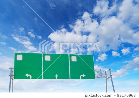 Blank green highway road sign on sky background.Empty road sign copy space Blank green highway road sign on sky background.Empty road sign copy space 88176968
